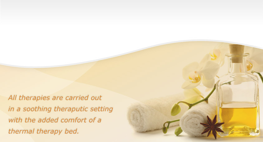 essential oils, flowers and massage towels